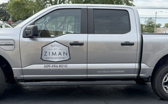 Ziman Development fleet truck featuring clean professional vehicle graphics for a high-end homebuilder in Harvey Cedars, New Jersey